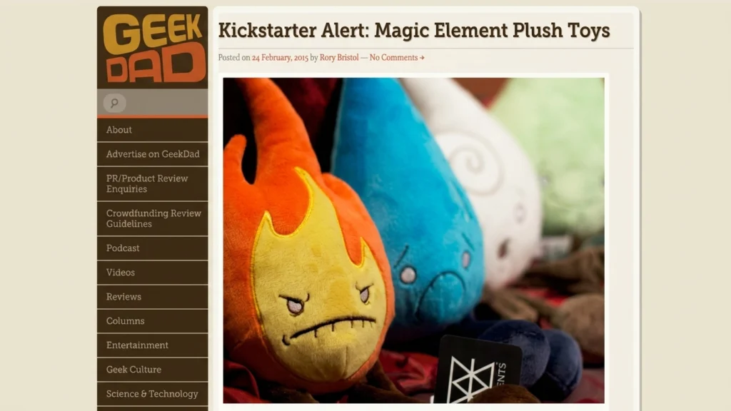 A screenshot of a GeekDad blog post titled "Kickstarter Alert: Magic Element Plush Toys" featuring a close-up photo of the Fire and Water elements.