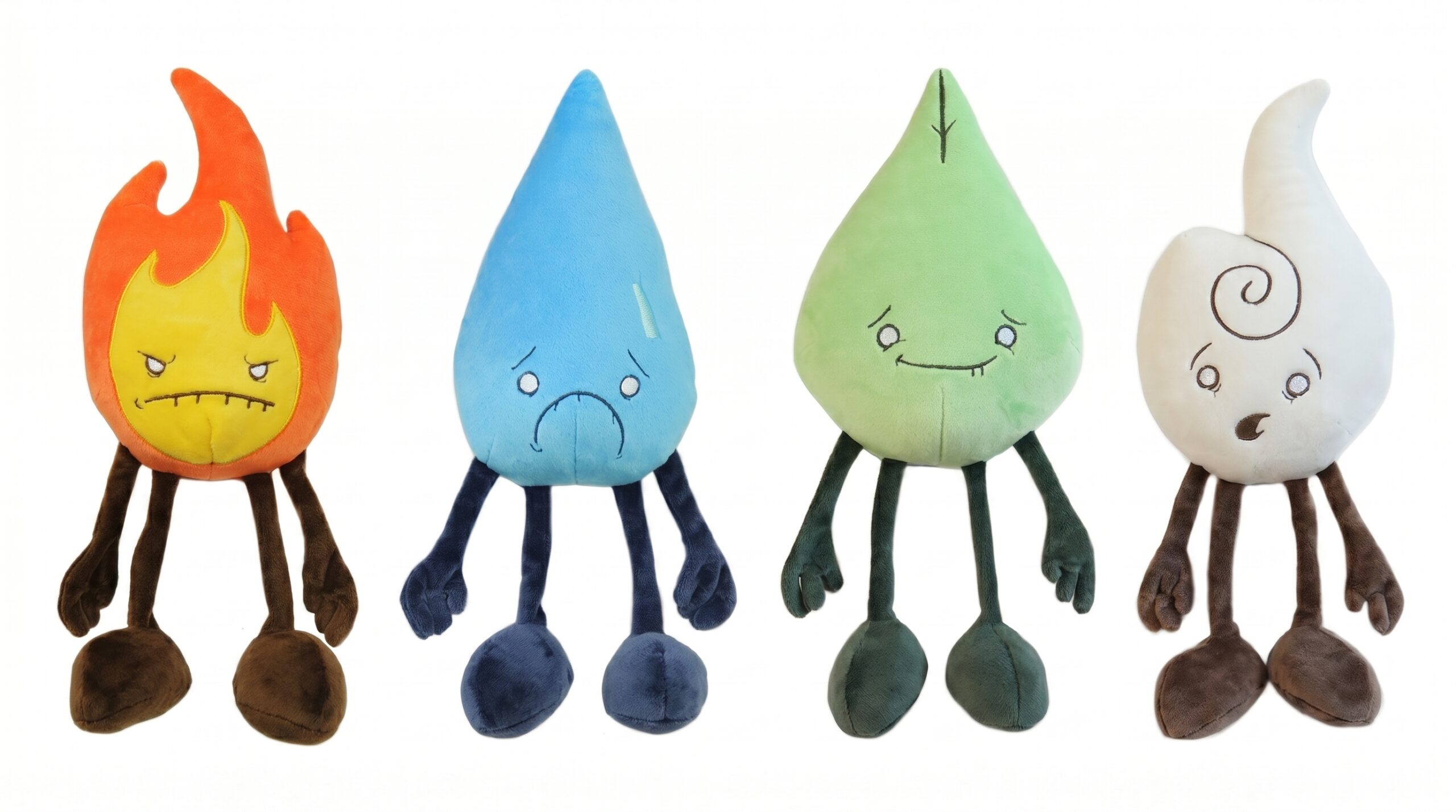 The four original pre-production prototypes of the Raven Stitch Plush Elements (Fire, Water, Earth, and Air) standing side-by-side against a plain white background, revealing their completed designs for the Kickstarter launch.