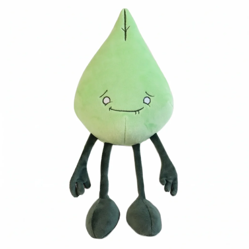 A smiling green leaf-shaped Earth Spirit designer toy with long dark legs, created by Denis Caron for the Plush Elements collection.